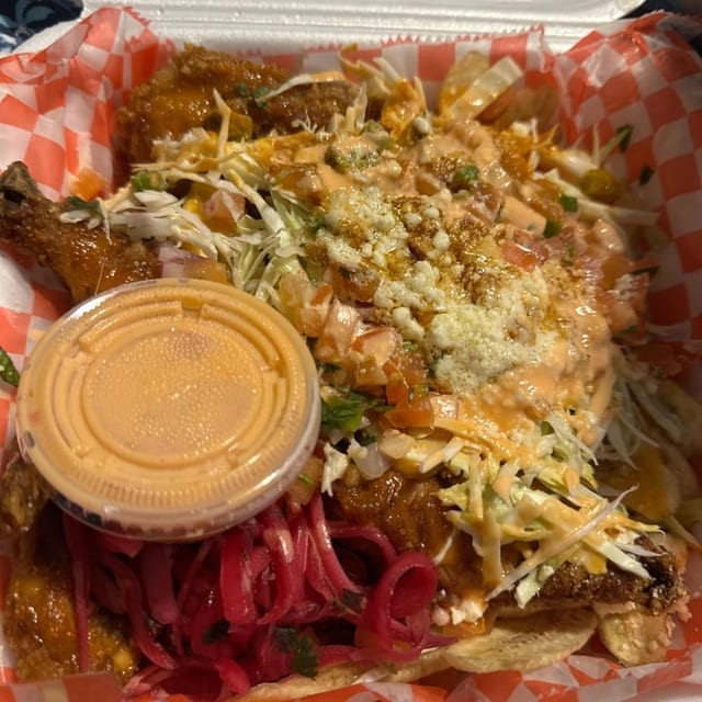 Pollo Con Tajadas.